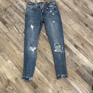 Distressed Blue Jeans